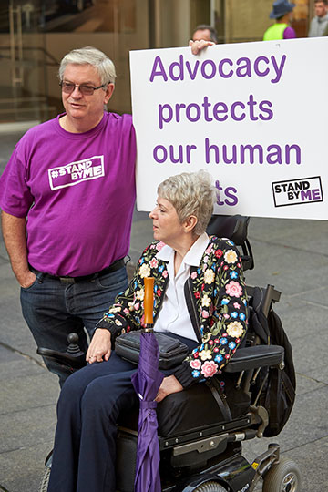 Rally for Disability Advocacy Funding - Man holding sign