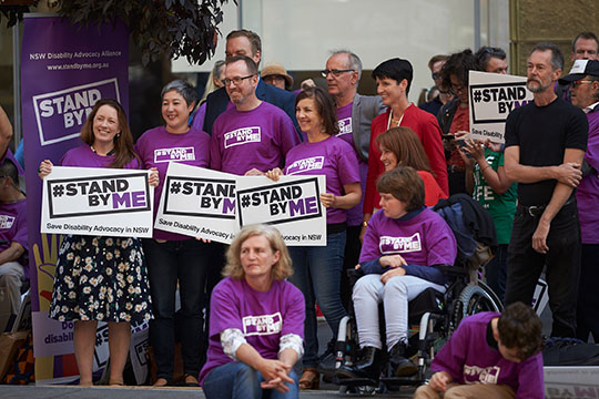 Politicians holding Stand By Me signs